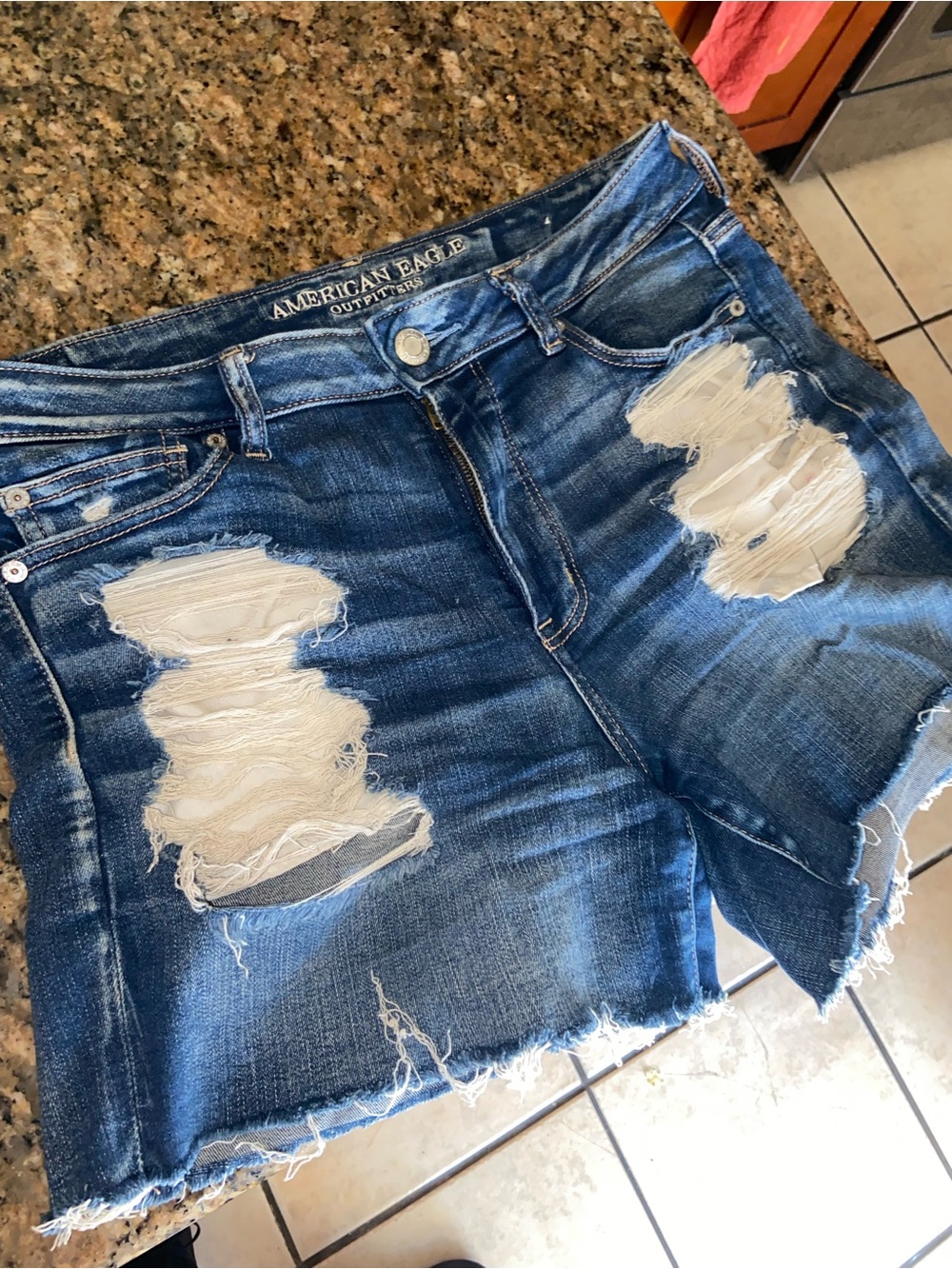 American Eagle Outfitters Distressed Denim Cutoff Shorts — Blue with White Patch
